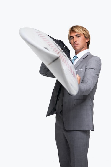 Surfer Ian Crane in GT Suit with Surfboard