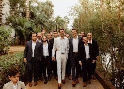 Michael Marielli and wedding party wearing Generation Tux Suits