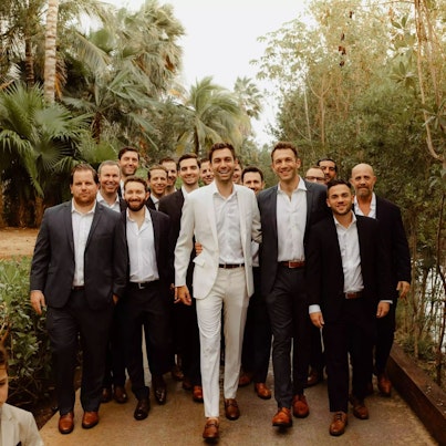 Michael Marielli and wedding party wearing Generation Tux Suits