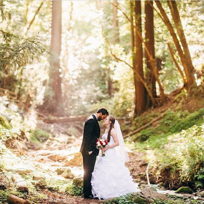 Bride and Room outside in a romantic valley.