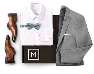 Menguin box with suit, shirt, blue bowtie and brown shoes